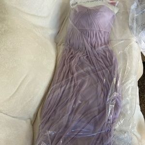 Long formal dress lilac color.